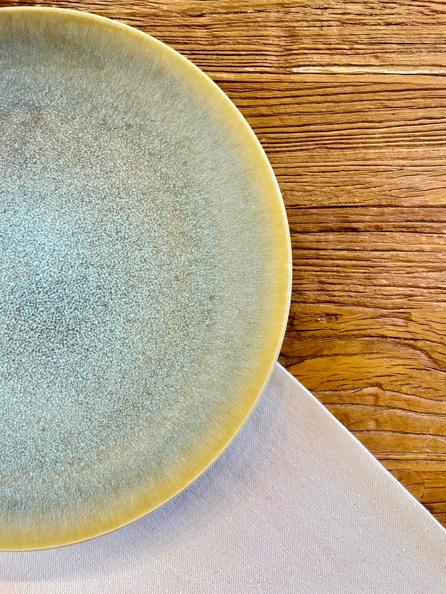 Dinner plate with green and blue tones